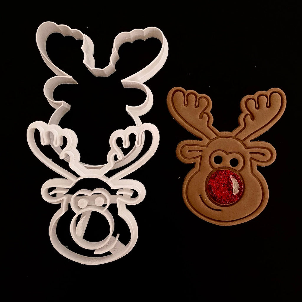 Rudolph the reindeer cookie cutter with fondant embosser