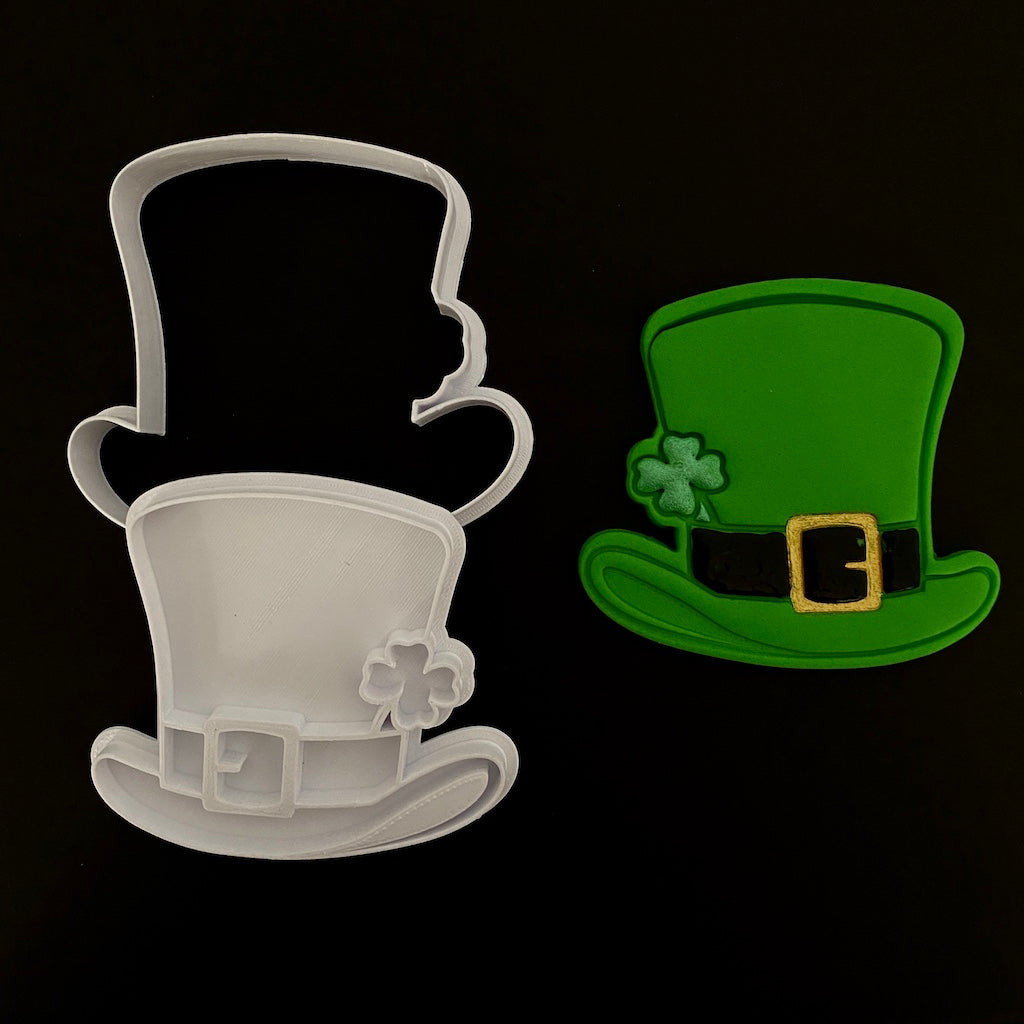 St patrick's day leprechaun's hat with shamrock clover cookie cutter with cookie stamp
