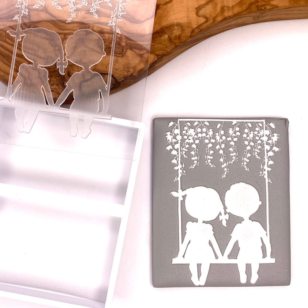 acrylic cookie stamp fondant embosser cookie cutter kids sitting on swing